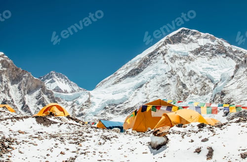 Preview: Bright yellow tents in Mount Everest Base Camp, Khumbu glacier and mountains, Nepal, Himalayas