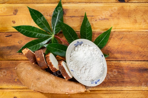 Preview: pile of cassava, cassava and cassava flour on a background of rustic wood (Manihot esculenta)