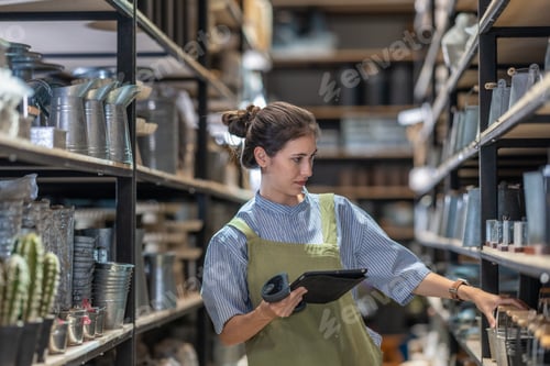 Preview: A Female Entrepreneur in a Family Run Ceramic Business Checking Stock