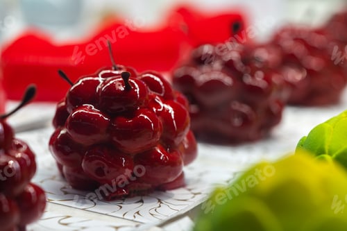 Preview: Beautiful delicious pastries on a showcase in a shop