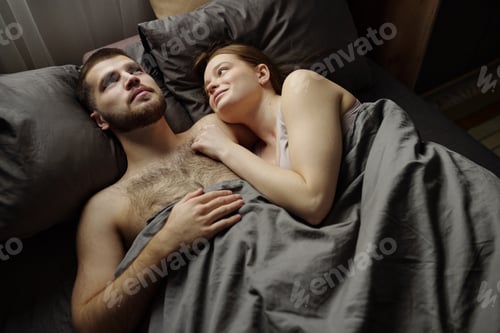 Preview: Couple Sharing Intimate Moment in Bed