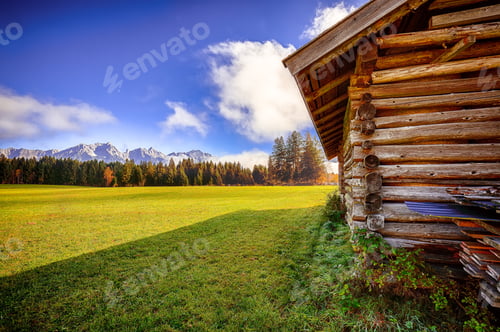 Preview: Misty morning view of green meadow near Mitterhofen village