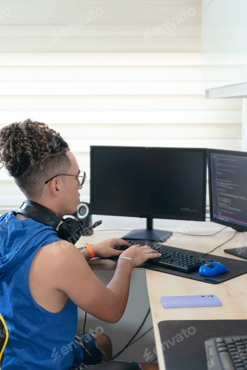 Preview: Computer Programmer Working In His Studio