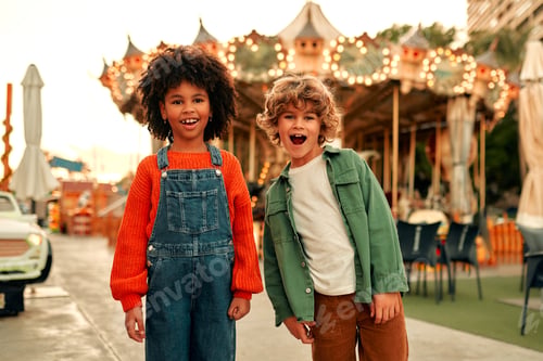 Preview: Kids having fun on a carnival Carousel