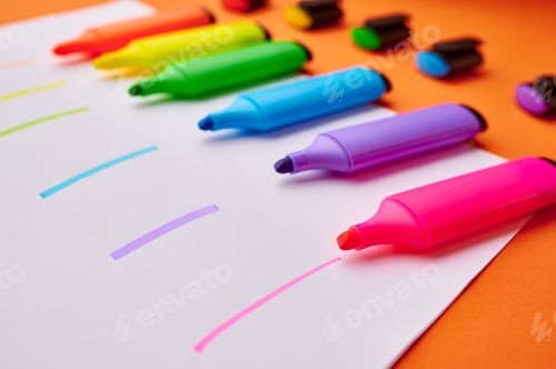 Preview: Colorful permanent markers on paper sheet
