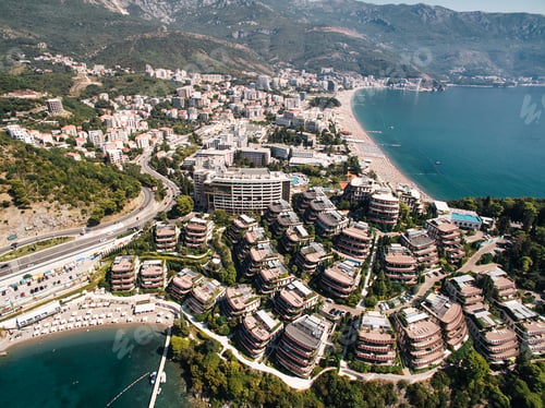 Preview: Private beach near modern villas with terraces on the seafront. Dukley, Budva, Montenegro. Drone