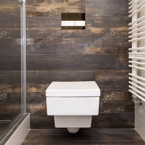 Preview: A modern wall-mounted compact square-shaped toilet in a brown tiled bathtub