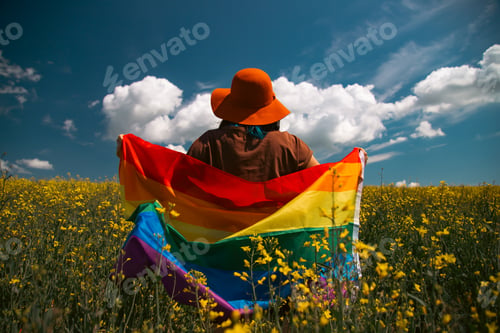 Preview: Young woman with LGBT flag.
