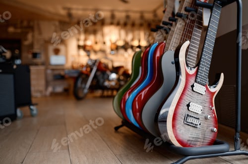 Preview: Electric guitar display at studio shop with big assortment of string instrument