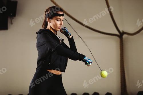 Preview: sportive young woman boxing workout