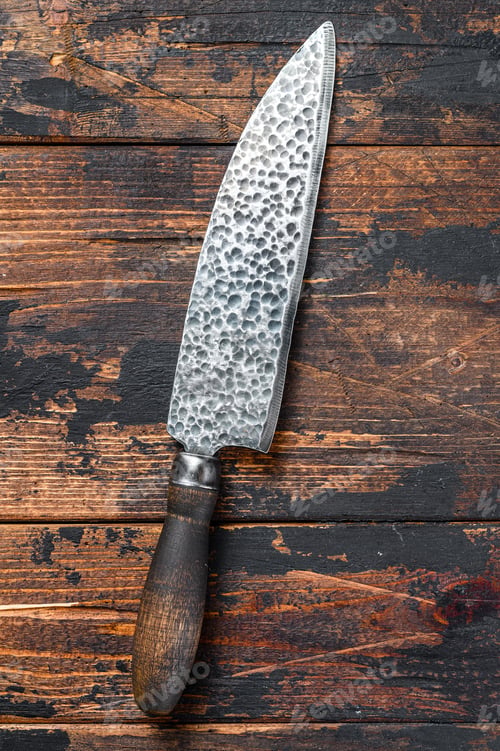 Preview: Vintage butcher meat knife. Dark wooden background. Top view