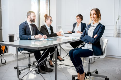 Preview: Business people during the conference in the office