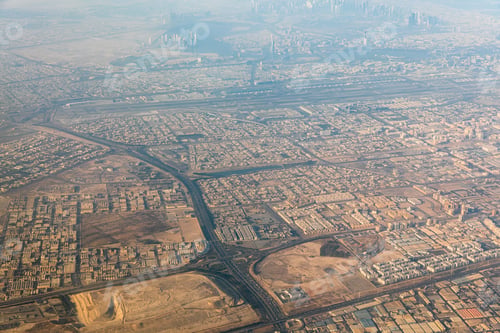 Preview: Aerial view of Dubai city suburb and Dubai International Airport