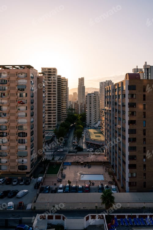 Preview: Residential buildings against sunset sky