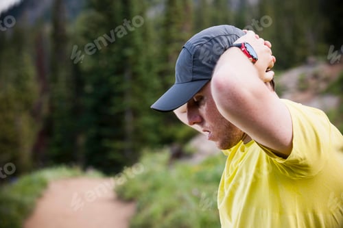 Preview: Runner taking break, Bloods Lake trail near Guardsman Pass, Wasatch Mountains, Utah, USA