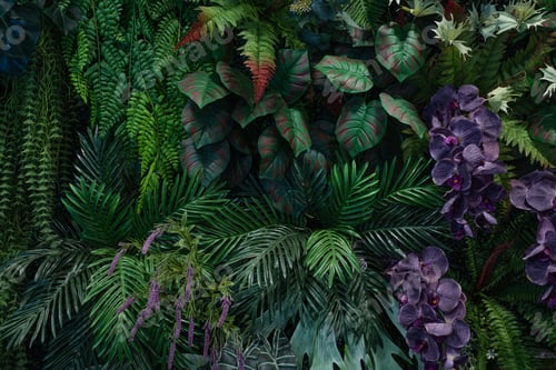 Preview: Group of dark green tropical leaves background.