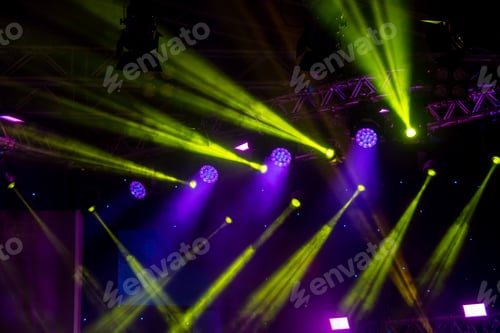 Preview: blue luminous rays from concert lighting against a dark background, musical instrument concept