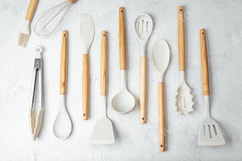 Preview: Kitchen utensils arranged neatly on a light background for home cooking