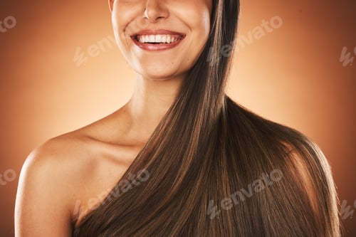 Preview: Beauty, hair and keratin with a model woman in studio on a brown background for natural treatment.