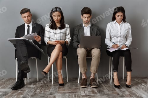Preview: focused multiethnic business people with digital devices and folders waiting for job interview