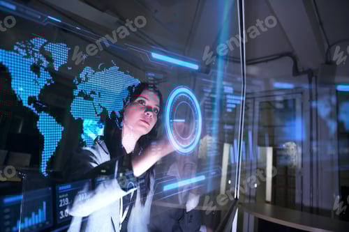 Preview: Business professional uses interactive technology to analyze global data in a modern office