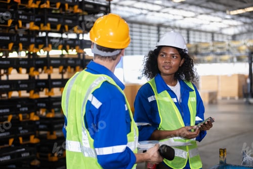 Preview: Two warehouse worker break and chatting working logistics