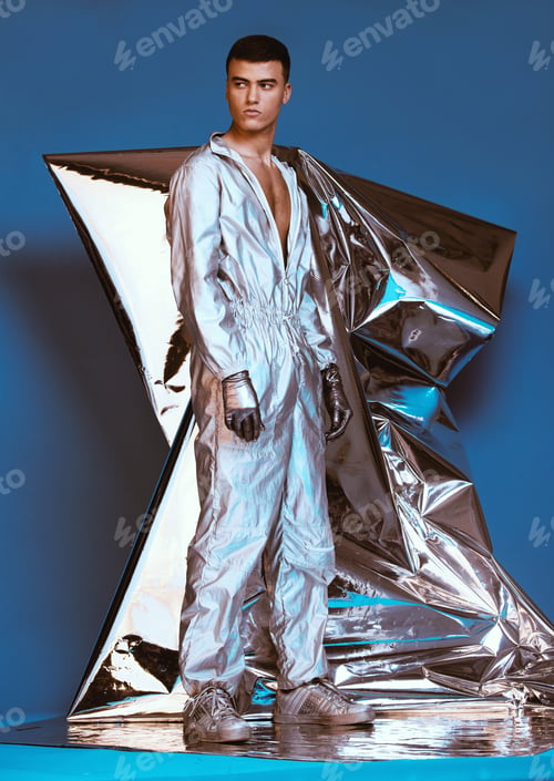 Preview: Holographic, vaporwave fashion and man with futuristic ski style with sci fi clothing in studio. Ar