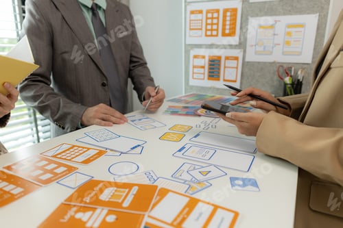 Preview: Digital product designers exchange ideas in their offices about how to design a website that meets