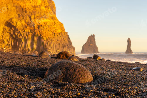 Preview: Detail of a gemstone on the black sand beach of Reynisfjara at sunset in Iceland
