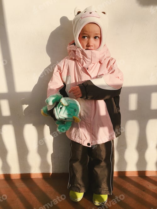Preview: Little girl standing and looking