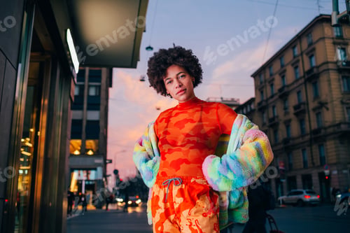 Preview: Young mixed race woman outdoor posing outdoor