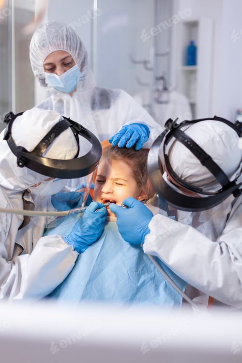 Preview: Dentist specialist treating child caries