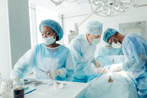 Preview: Dedicated Healthcare Professionals Performing Surgery in Operating Room