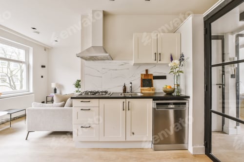 Preview: a kitchen with white cabinets and a stainless steel sink