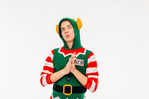 Preview: Attractive young men teenager in elf costume on white background