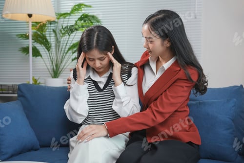 Preview: Psychologist comforting patient having headache during therapy session