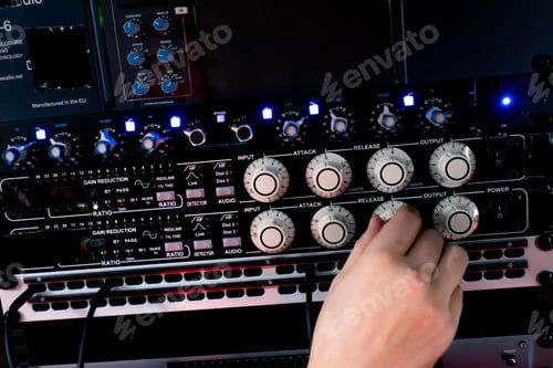 Preview: close up the recording room dark with neon lighting in the studio the sound engineer works with the