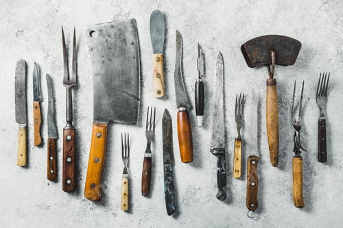 Preview: Old knifes on a grey background