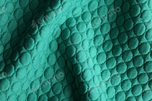 Preview: Textured turquoise fabric as background, closeup view