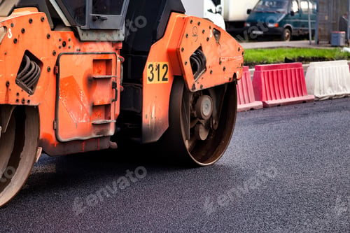Preview: Paving Urban Street With Asphalt Concrete Using Heavy Machinery for Road Construction