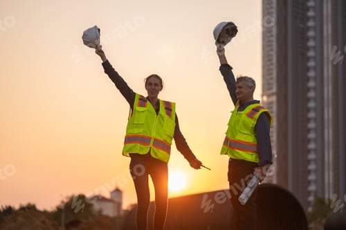Preview: Construction surveyor or engineer working in pipe construction site