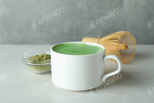 Preview: Matcha latte and accessories for making on white textured table