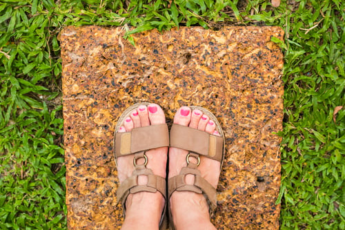 Preview: Feet selfie from upper view of a woman traveler in sandal