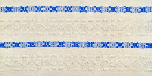 Preview: The White Weaved Fabric With The Blue Textured Ethnic Pattern For An Abstract Background Or For