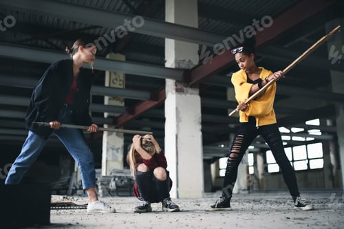 Preview: Teenage girl attacked by thugs in abandoned building, gang violence and bullying concept.