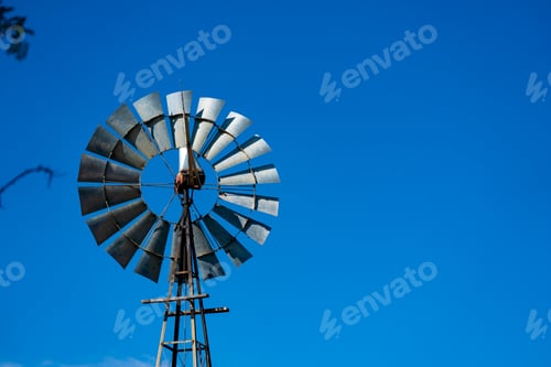 Preview: Windmill Against a Blue Sky