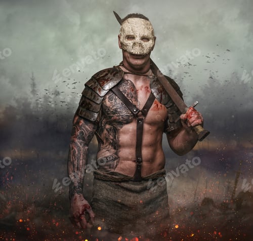 Preview: Male in the skull mask holds sword in the dust batterfield background.