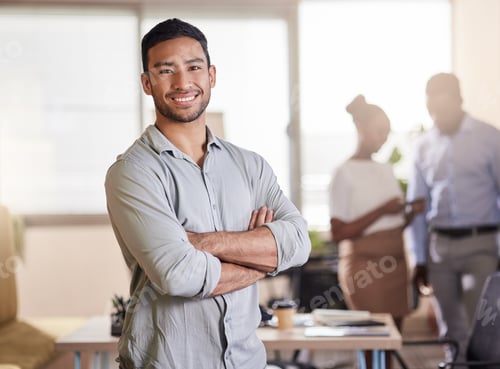 Preview: Im the one they call to close the deal. Shot of a young businessman in his office.