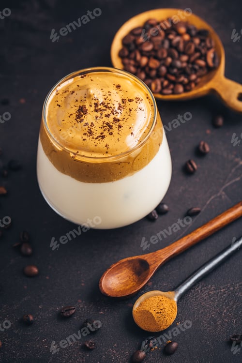 Preview: Iced fluffy creamy whipped trend drink with coffee foam and milk. Dalgona coffee.