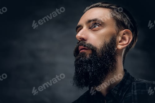 Preview: Bearded male looking up.